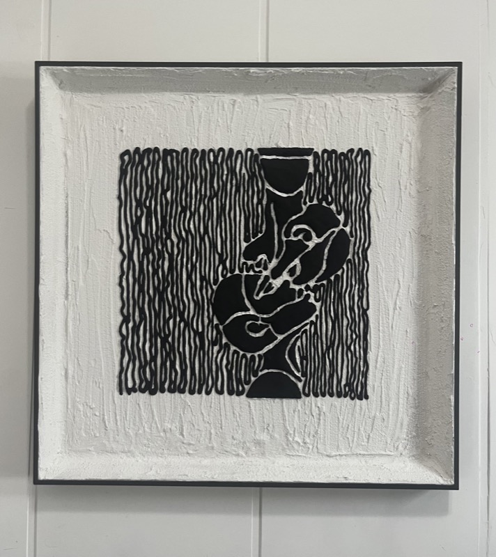Containment — black and white figure framed in textured grout